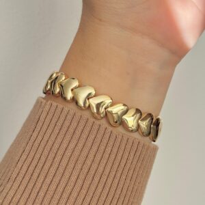 Brazelete de corazones dorado